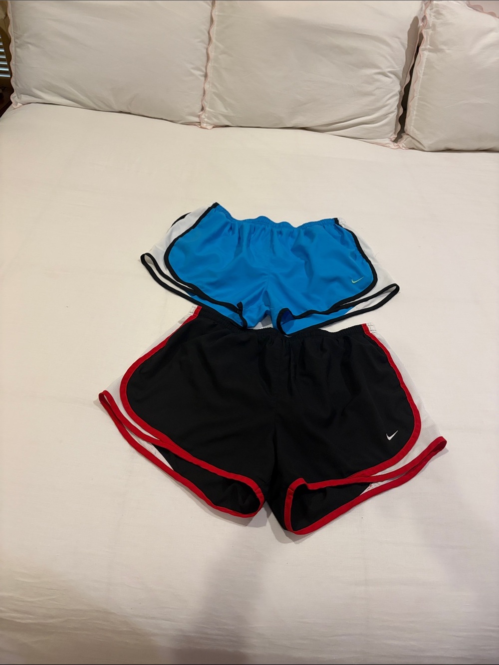 Nike Women's Black Athletic Shorts with Red Trim and Blue Pair